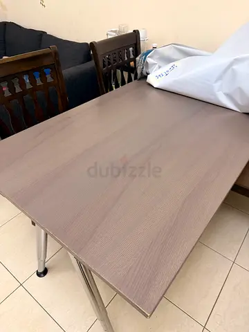 Wooden Dining Table with Metal Legs - Good Condition height adjustable