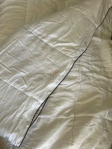 White Quilted Comforter with Grey Piping