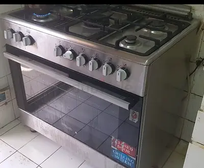 Offer for only one day , Used 5-Burner Stainless Steel Gas Range 
 , with Oven - Working Condition