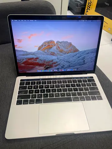 MacBook Pro 13-inch (Silver) - Good Condition, Ready to Use. Flex Gate issue which can be repaired.