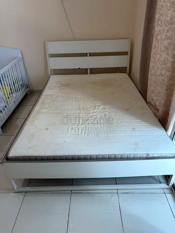 Ikea bed 210/ 150 with mattress.