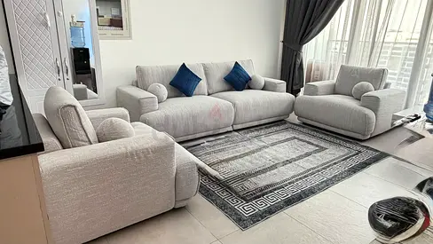 Light grey 3-seater sofa set with armchairs and matching rug - Good condition