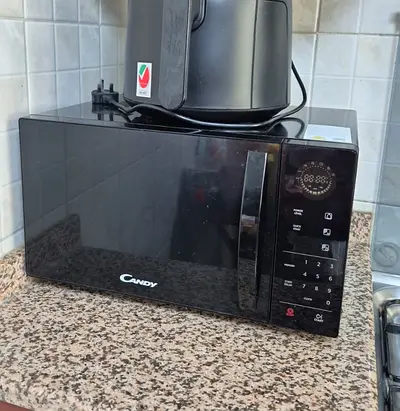 Candy black microwave - good working condition