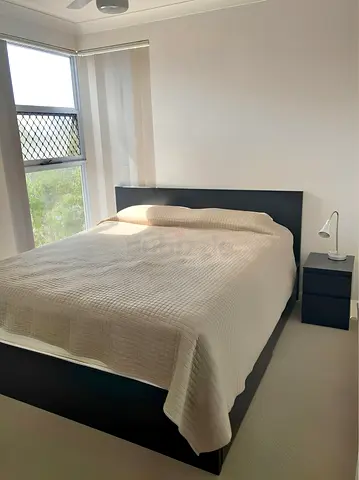 IKEA Malm king size bed frame with mattress.