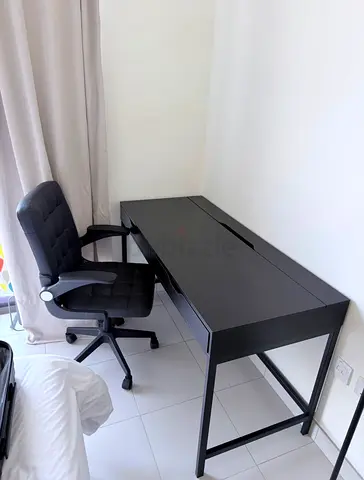 Black modern office desk with swivel chair - good condition