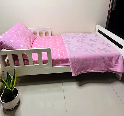 IKEA White toddler bed with mattress and bedding