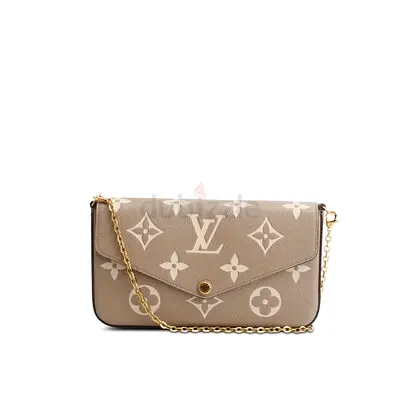 Authentic Louis Vuitton Tourterelle Monogram Empreinte Leather Felicie Pochette
