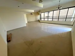 Three-bedroom apartment with a living room for annual rent in Al Majaz 2, featuring four bathrooms,