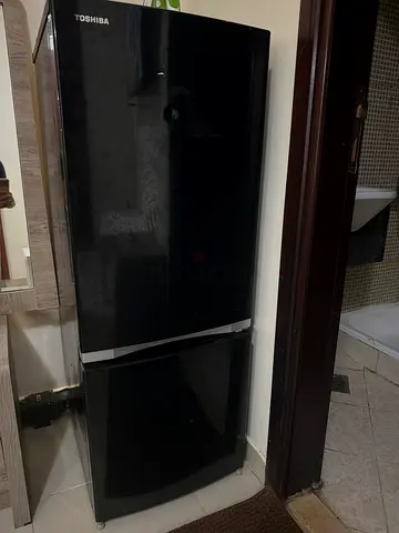 Toshiba black refrigerator with freezer - good working condition