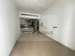 1BR Apartment | Rigel JVC | Pool &amp; Courtyard View | Open-Plan Kitchen