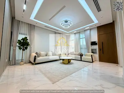 Villa for sale next to the mosque and near Sheikh Mohammed Bin Zayed Road, excellent finishing at an attractive price including registration fees and