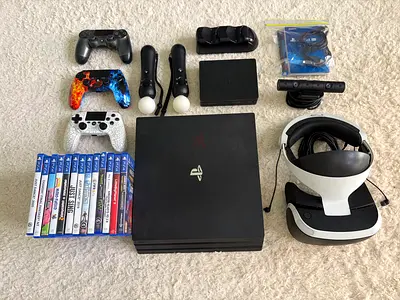 PlayStation 4, PS VR, PSVR processor unit, 13 games and charging dock.