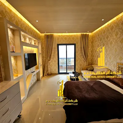 استوديو فاخر  مع بلكونة بالنعيمية تاور سى مفروش بالكامل فرش جديد راقى جدا للايجار الشهرى شامل كافة الفواتير والانترنت