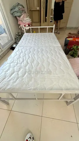 Single folding metal bed frame - good condition