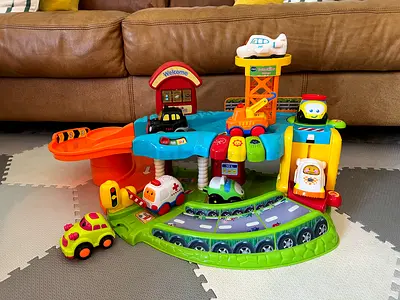 VTech Little Vehicles Playset with Ramp, Elevator and Cars - Good Condition