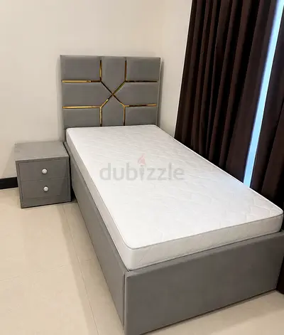 Brand New Single grey upholstered bed with mattress