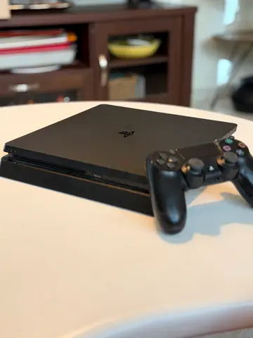 PlayStation 4 Slim with DualShock 4 Controller - Good Condition.