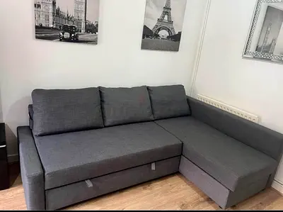 IKEA Grey L-shaped Sofa Bed with Storage - Good Condition