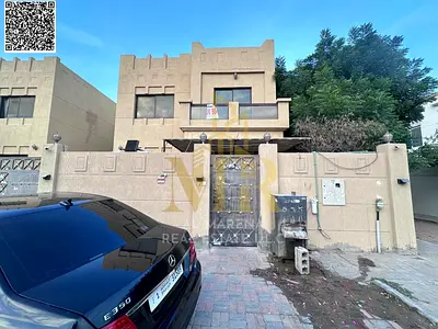 Villa for sale in Al Muwaihat 3 – Ajman | Corner street and alley | 5 master bedrooms | Currently rented with investment returns | Area 3,200 sq ft |