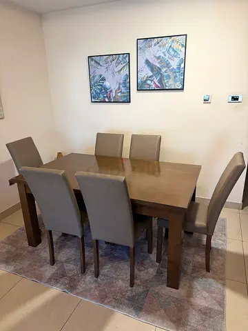 Home Center Wooden dining table with 6 upholstered chairs - good condition
