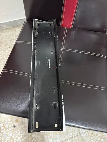 Used TV wall mount bracket — single metal rail