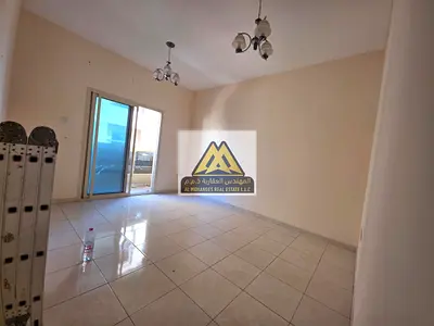 The apartment features a large layout, a beautiful balcony, and central air conditioning in a prime location close to all services with easy access to