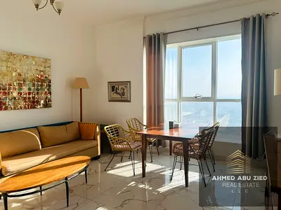 1BR apartment with hall for annual rent in Oasis Tower, Tower 2. Fully furnished, 2 bathrooms, high floor with creek view, private parking. Annual ren