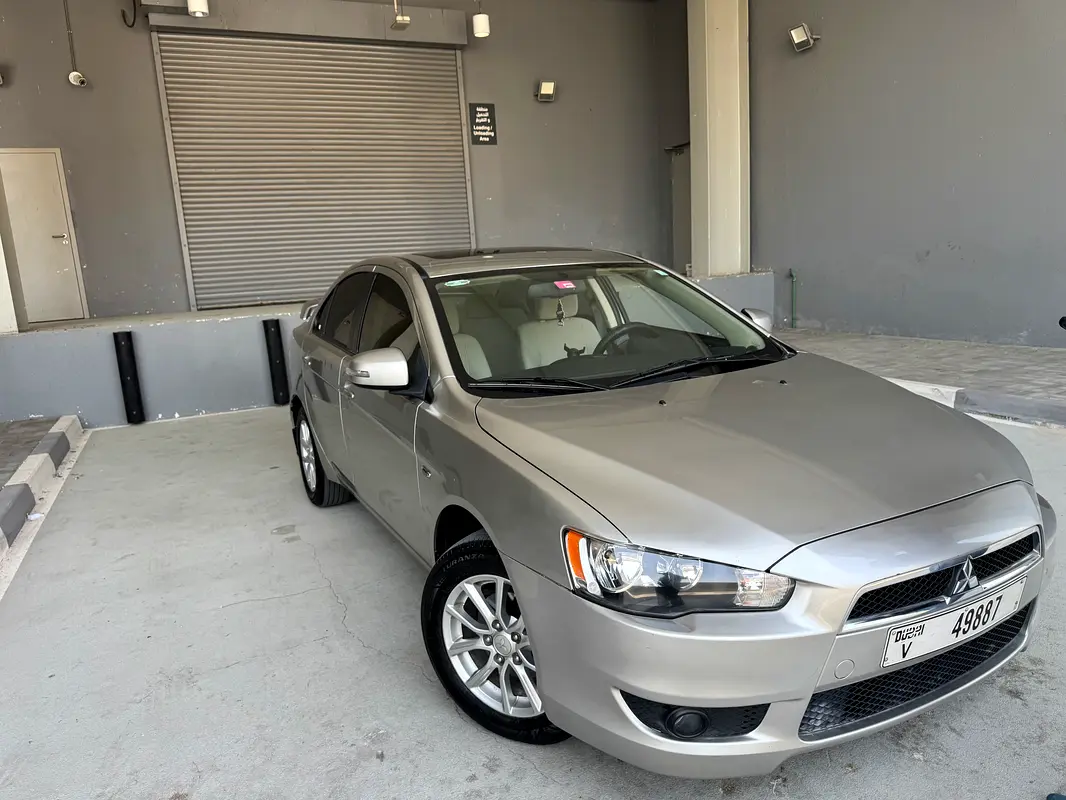 Mitsubishi Lancer 2016 — photo 1 of 2