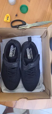 School shoes- black color- puma  sketchers brand