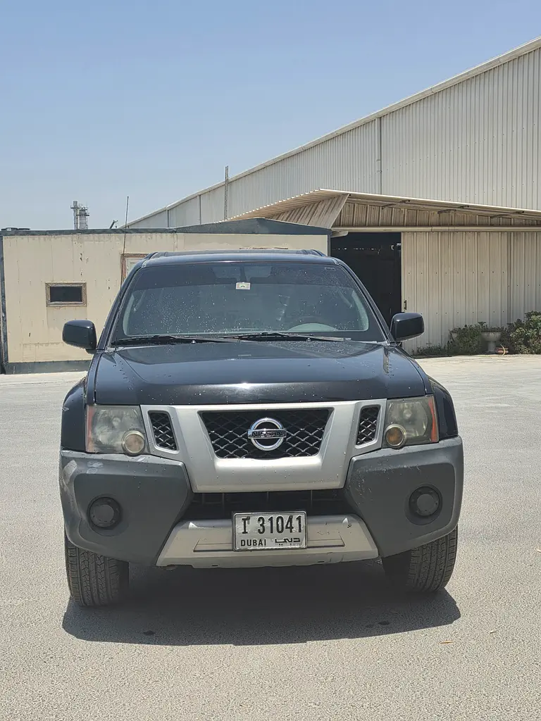 Nissan Xterra 2012 — photo 1 of 8