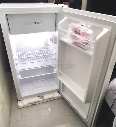 Compact single-door fridge with small freezer - good working condition