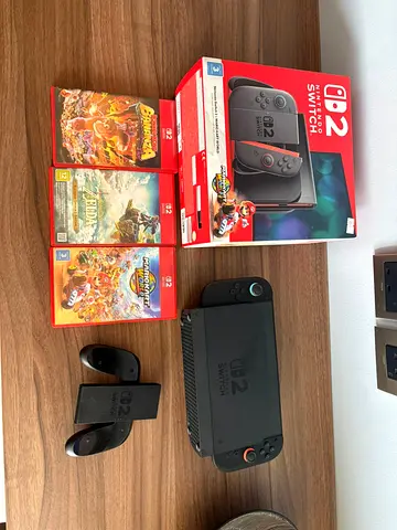 Nintendo Switch OLED (Model OLED) with Mario Kart, Zelda and Super Mario Party — Great Condition