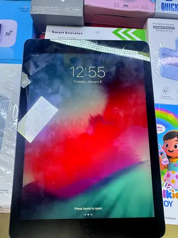 Apple iPad with home button and black bezel