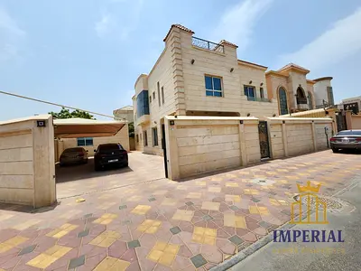 🏡 فيلا فاخرة للبيع في المويهات 2 – عجمان | زاوية شارعين وسكة | 6200 قدم | 5 غرف ماستر | جاهزة للسكن
