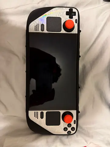 Steam Deck OLED 512gb + dbrand killswitch case + dock + 8bitdo controller