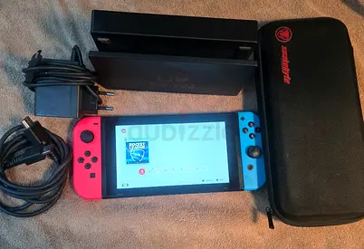 NINTENDO SWITCH V1 +1 GAMES WITH BAG