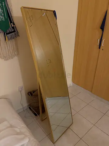 Full-length freestanding wooden framed mirror
