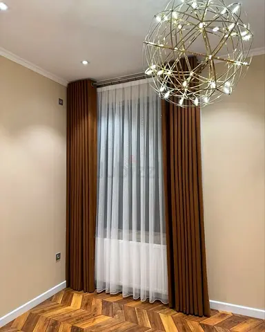 Floor-to-ceiling brown blackout curtains with white voile sheer - ready to hang