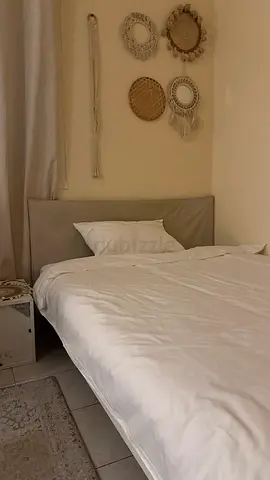 Double bed with headboard and bedding - good condition