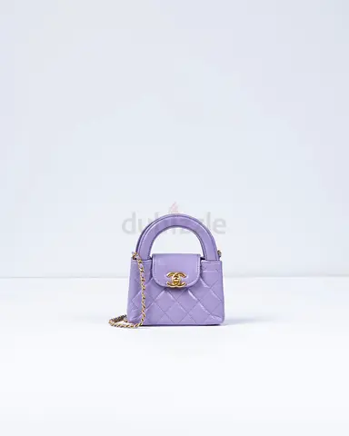 Authentic Chanel Kelly Bag Shiny Aged Calfskin  Gold-Tone Metal in Lavender Micro size