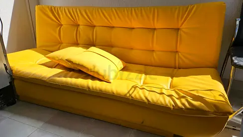 Move out sale Yellow convertible sofa bed - good condition