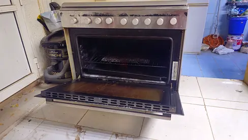 Used freestanding gas oven with stovetop — working condition, needs cleaning