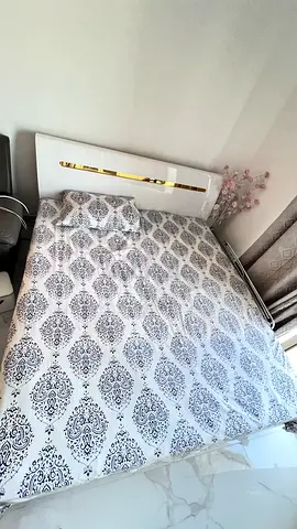 White double bed with mattress, one 6door wardrobe tv cabinet and shoe rack