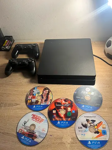 Sony PS4 Slim with 2 Controllers and 6 Games - Good Working Condition