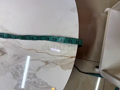 Round marble-look side table (approx. 30cm radius) - good condition