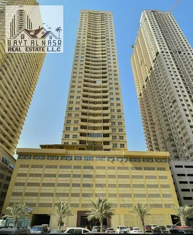 Beautiful 7-Bedroom Hall Apartment for Rent in Paradise Lake Tower B6, Emirates City, Ajman | Prime