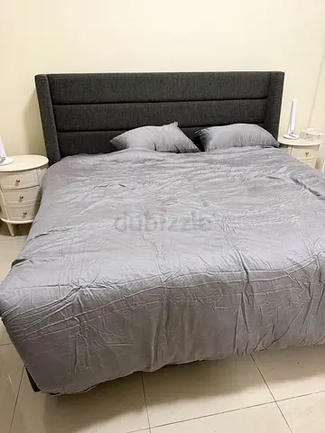 IKEA King size bed with mattress and side table