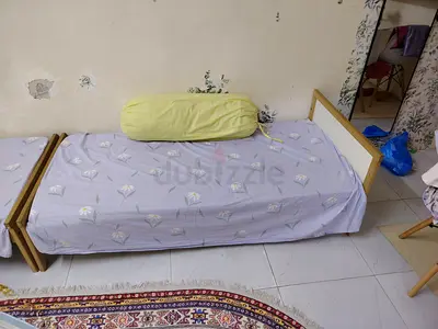 Used 2 Ikea Sniglar wooden bed frames with perfect slatted base and 2semi medical mattress.