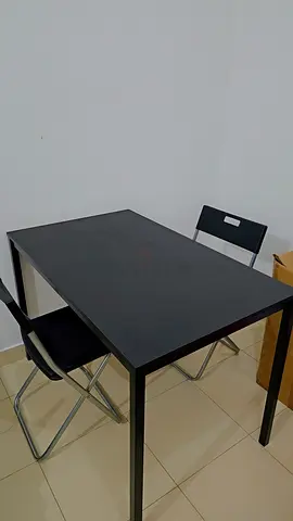 Black table ikea with chairs