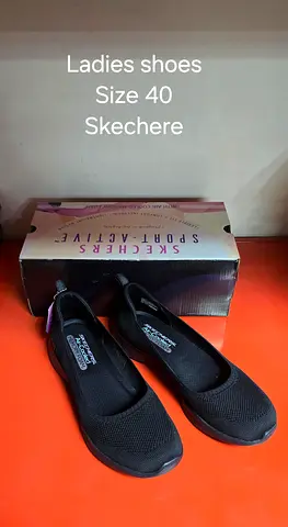 Black Skechers ladies flats - size 40,